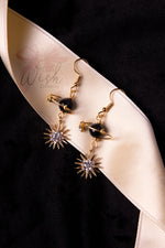 Schwarze Kristallmond-Ohrringe