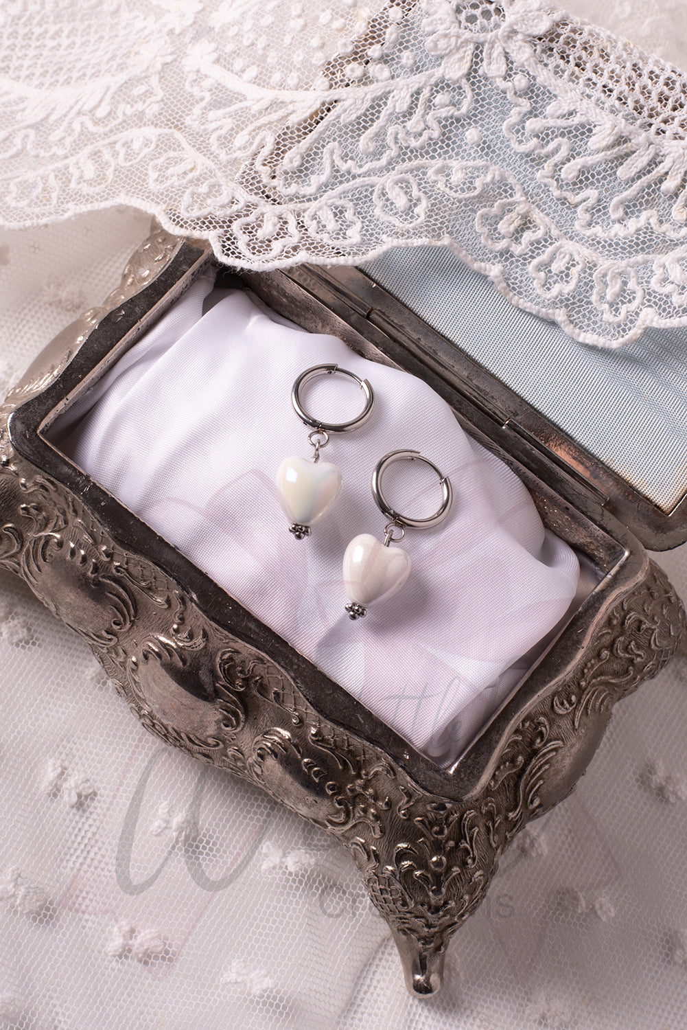 Petit Cœur silver earrings